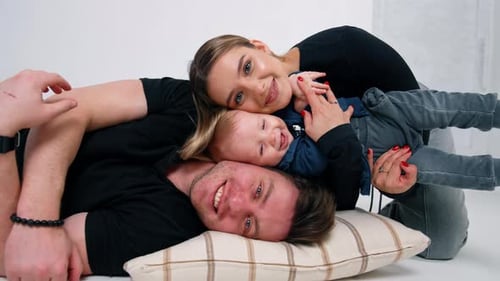 Loving Family Portrait with Baby Smiling