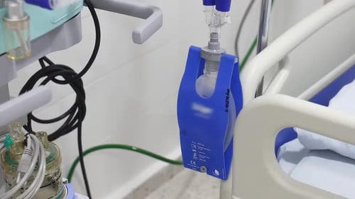 Hospital Medical Equipment Next to Patient Bed