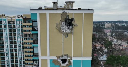 Damaged Residential Building Exterior in Urban Setting