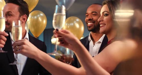 Friends Toast Champagne at Celebratory Gathering