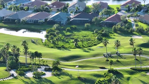 Active Lifestyle of Wealthy People Aerial View of Players Practicing in Golf on Vast Green Golf
