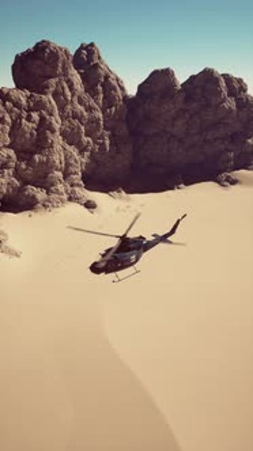 Helicopter Flying Over Desert Rocks