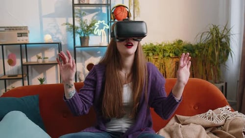 Woman Experiencing Virtual Reality on Couch at Home