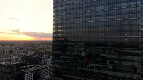 Modern Buildings In The Business District Of Warsaw At Sunset In Poland. Aerial Close-up Shot