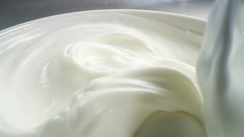 Stirring Vanilla Yogurt In Slow Motion.