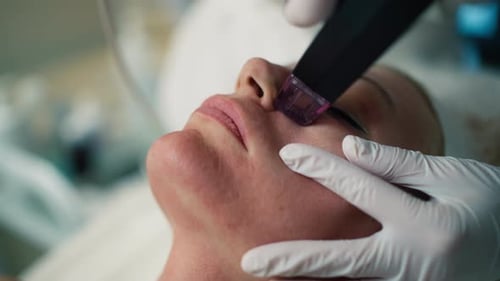 Face Treatment Procedure in Beauty Clinic Close Up