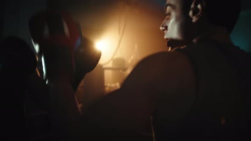 Two Fighters Sport Punching Competition on the Ring of the Gym