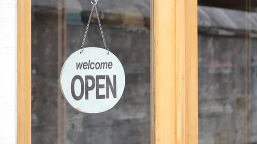 Store Welcomes Customers with Open Sign