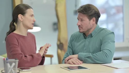 Young Creative People Talking in Office