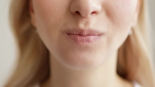 Young Woman Eating Crisp Chip, Food Close Up