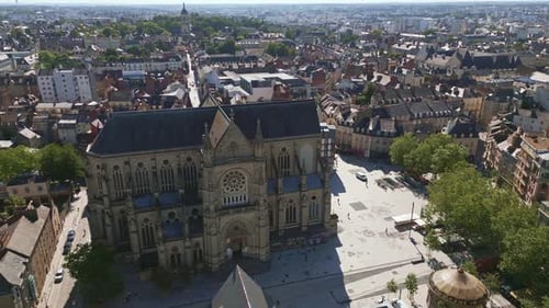 Basilica Saint-Aubin in Place Sainte Anne square, Rennes in France. Aerial drone sideways