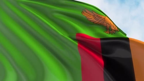 Realistic Waving Flag of Zambia on Blue Sky