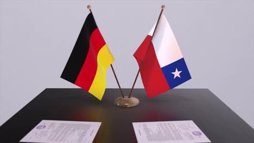 Flags of Germany and Chile on Table