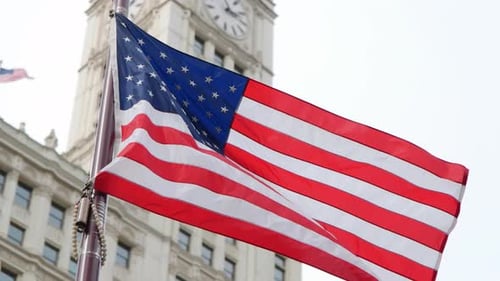 American Flag Waves Proudly in Urban Setting