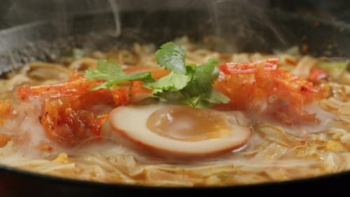 Close Up of Steaming Bowl of Ramen