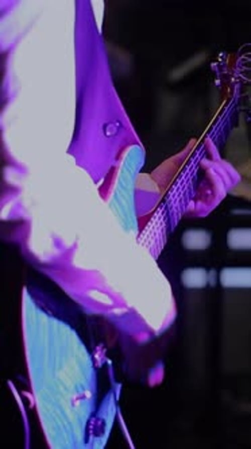Live Guitar Performance at an Intimate Venue During the Evening