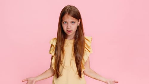 Child Girl Kid Raising Eyebrows in Surprise Showing Gesture What Why with Puzzled Emotional Reaction
