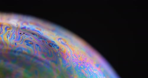 Iridescent Swirling Liquid Macro Abstract