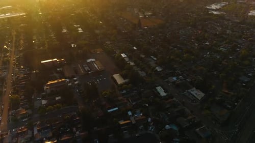 City of Napa, California, USA at sundown. Vast urban panorama against bright sunny backdrop
