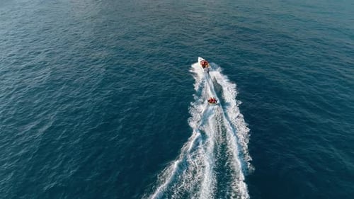 Sports Boat Sails Fast on the Sea Aerial View 4 K