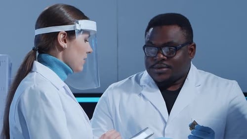 Scientific Laboratory Filled with Various Research Equipment Scientists are Conducting Experiments
