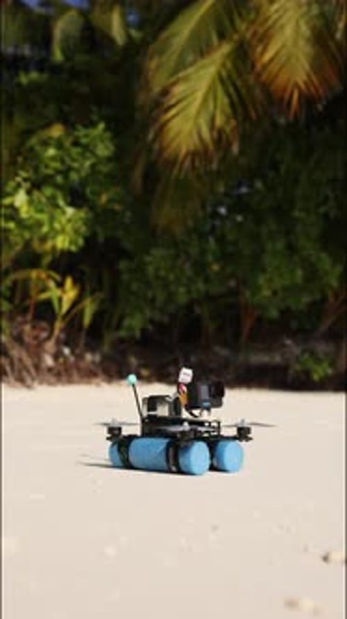FPV Drone Takes Off From the Sand in the Maldives Vertical Footage