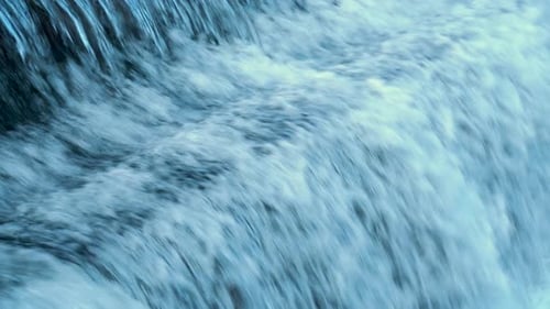 Water Flowing Down a Cascading Waterfall