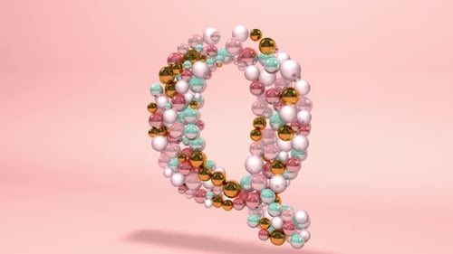 Animated Glossy Spheres Form Letter Q on Pink Background