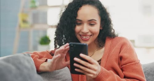 Happy, woman and smartphone on couch, lounge and reading social media post, online chat and search