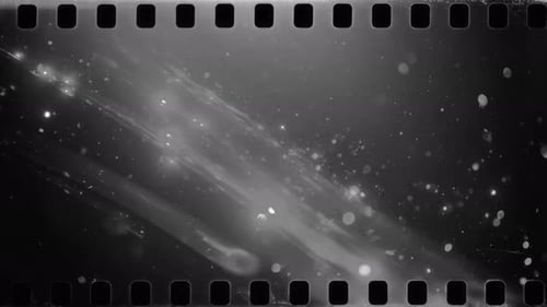 Vintage Film Grain Overlay with Light Leaks and Dust