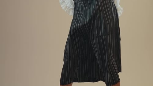 Gender fluid young man wearing fashionable clothes