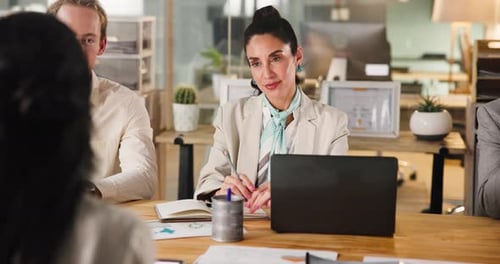 Diverse Business Team Meeting in Bright Office