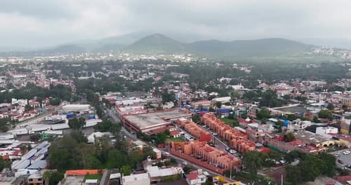 Drone panoramic shot of the Tepotzotlán mountains, transitioning from the foreground of the magical
