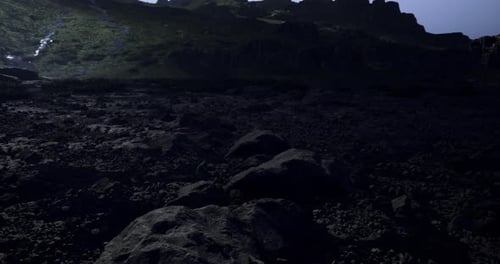 Lunar Like Landscape at Twilight with Rocky Terrain and Distant Hills