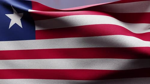 Liberian Flag Waving Against a Sunset Sky