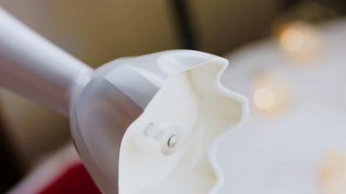 Close Up of Immersion Blender Blending Ingredients