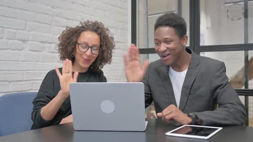Multi Ethnic People Doing Video Chat on Laptop