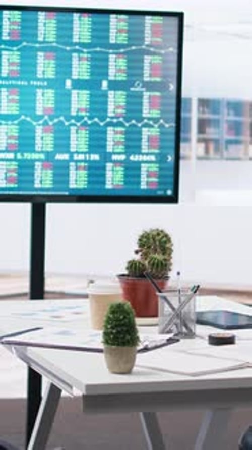Vertical Video Big Screen in Financial Department Office Shows Stock Exchange Indices