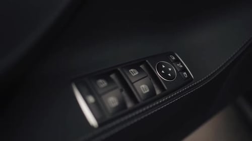 Close up buttons on the modern car's doors