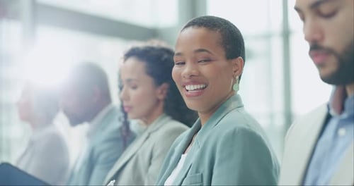 Face, smile and a business black woman in a workshop with colleagues for training at a seminar