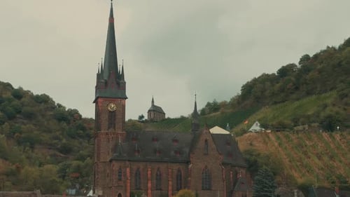 4k German red church with tiny church in background