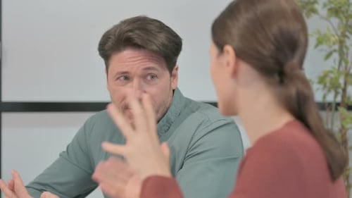 Close Up of Business People Talking in Office
