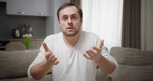 Shocked Man Gasps at Something Amazing