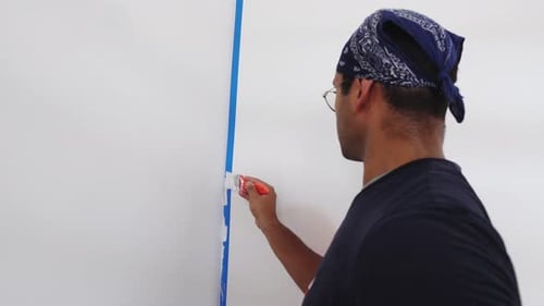 Painter Painting The Wall Edge With Brush - Close Up