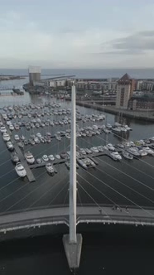 Aerial video of Swansea Marina and Millennium bridge, Maritime Quarter, Swansea, South Wales