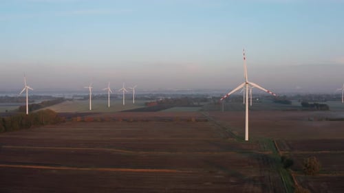 Scenic Wind Turbines at Sunrise in Rural Area