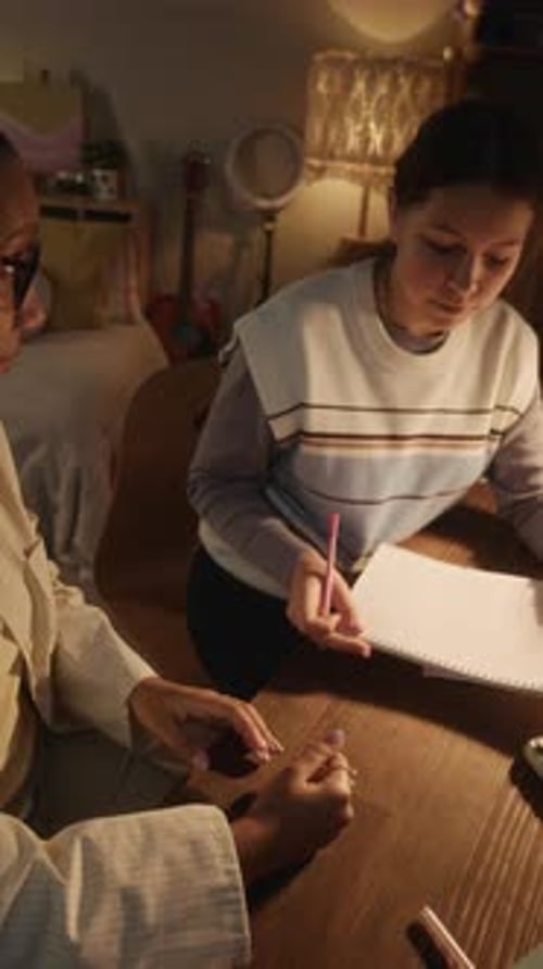 Tutor Watching Student Doing Task
