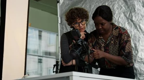 Photographer and Food Stylist Taking Pictures in Studio