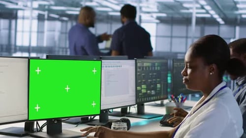 IT Professional Coding on Chroma Key PC in Data Center