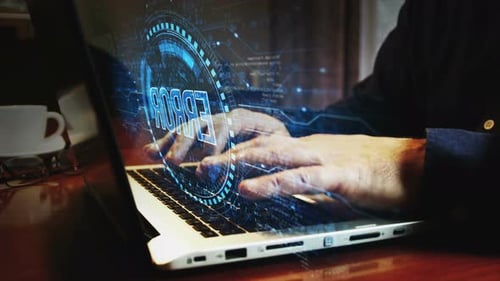 Error warning symbol and man typing keyboard